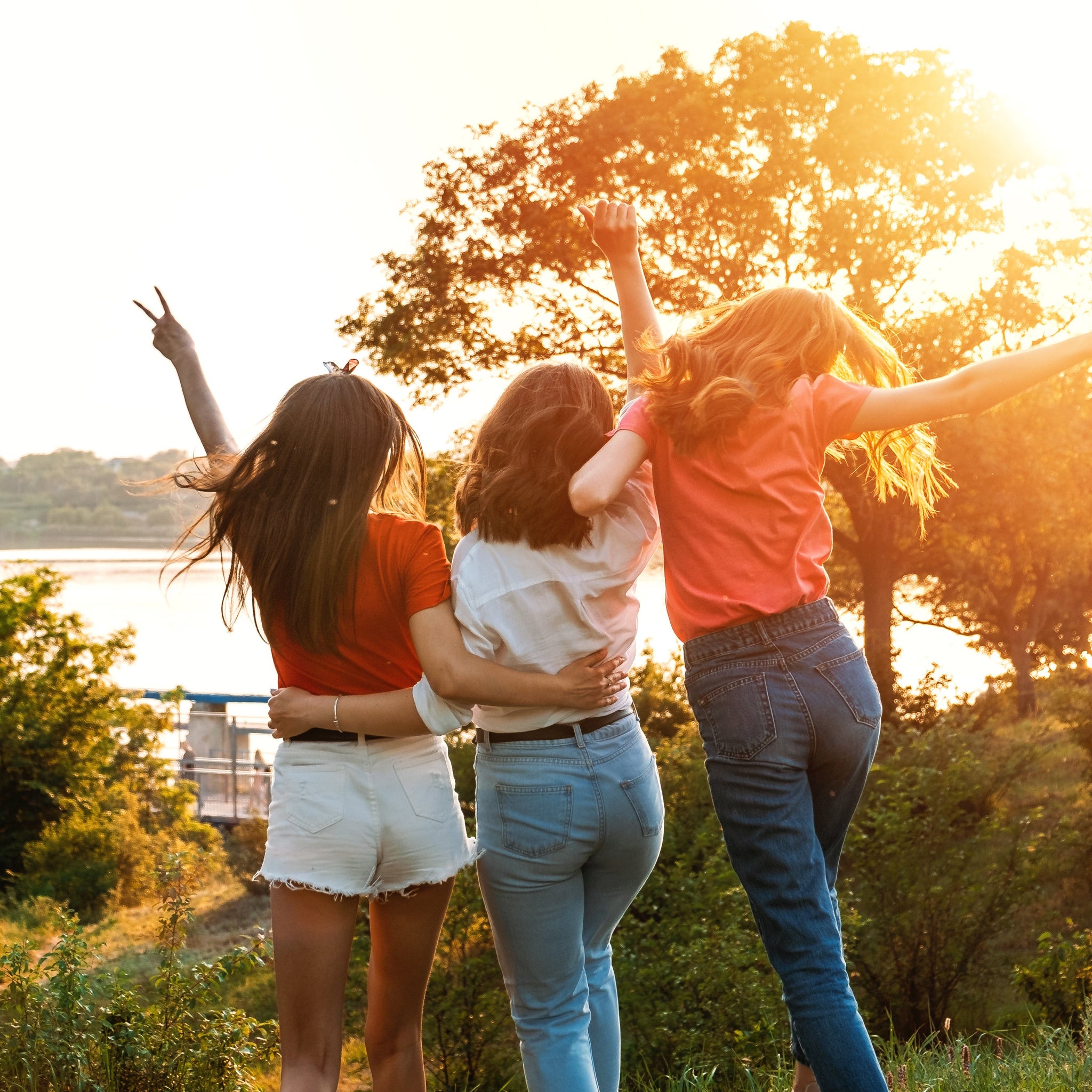 3 young ladies feeling happy